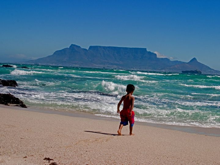 Table Mountain's flat summit rising above Cape Town seen across Table Bay from Blouberg
