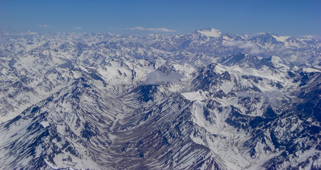 Snowy Andes peaks stretching across the horizon in central Chile