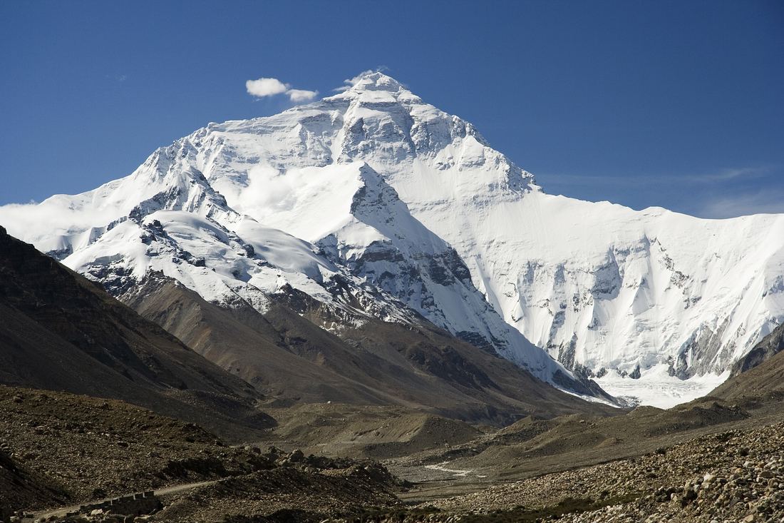 The north face of Everest seen from the Tibetan side under a blue sky