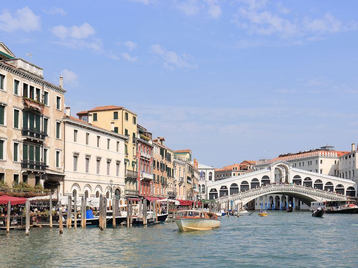 Panorama of the Grand Canal in Venice with the Rialto Bridge and palaces along the water